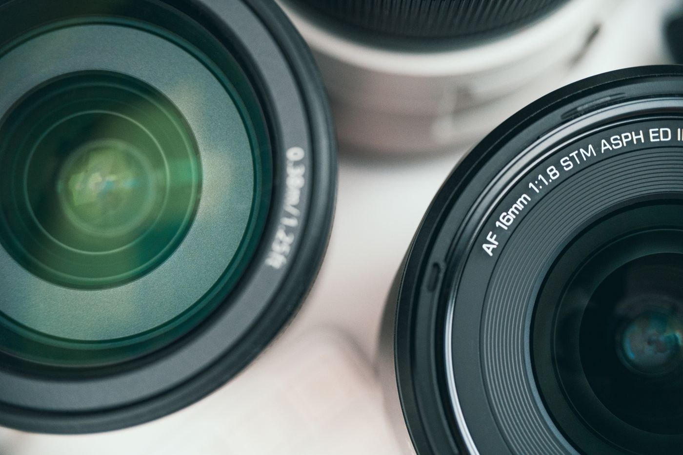 Close-up of several camera lenses