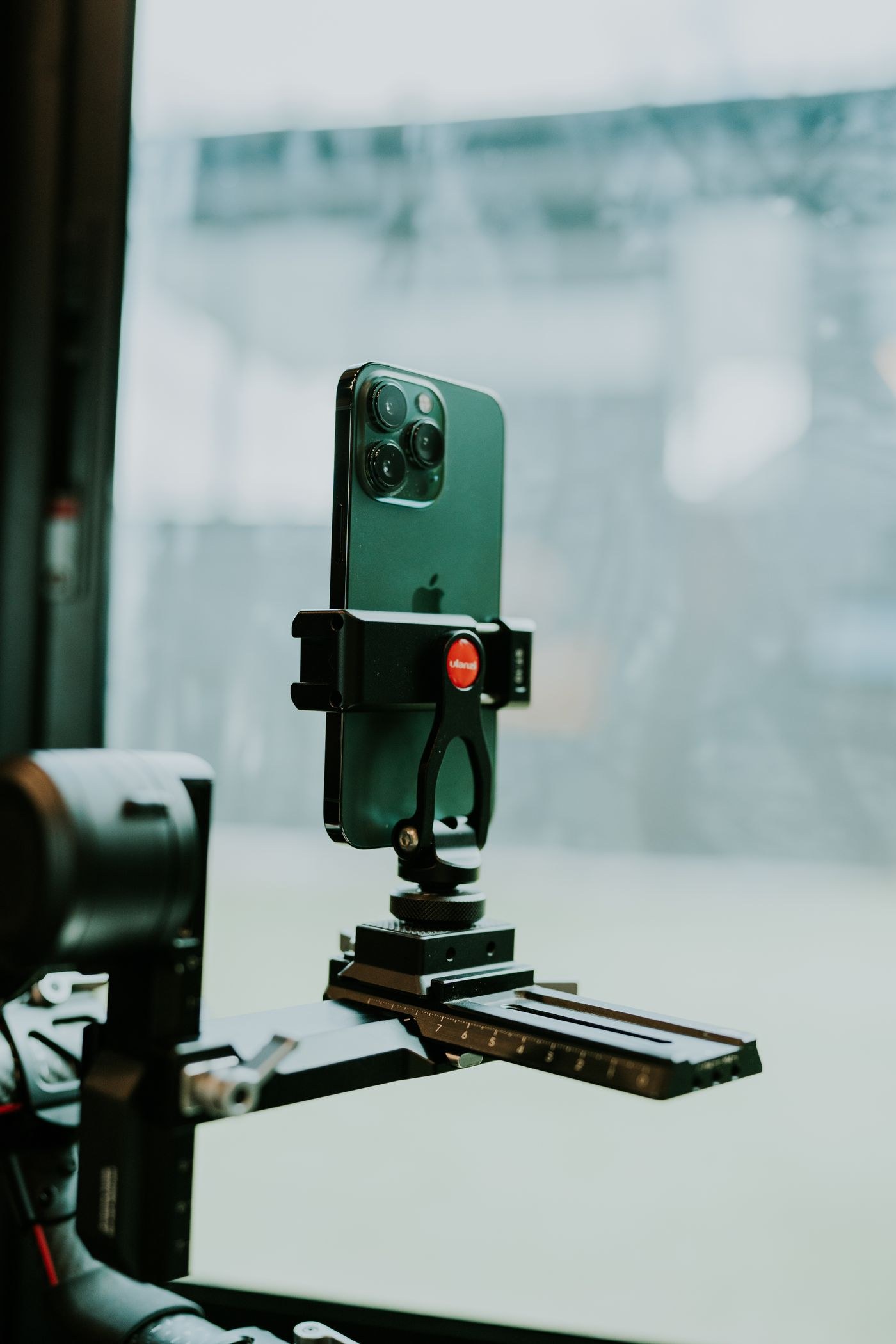 Smartphone secured in a clamp on a small support