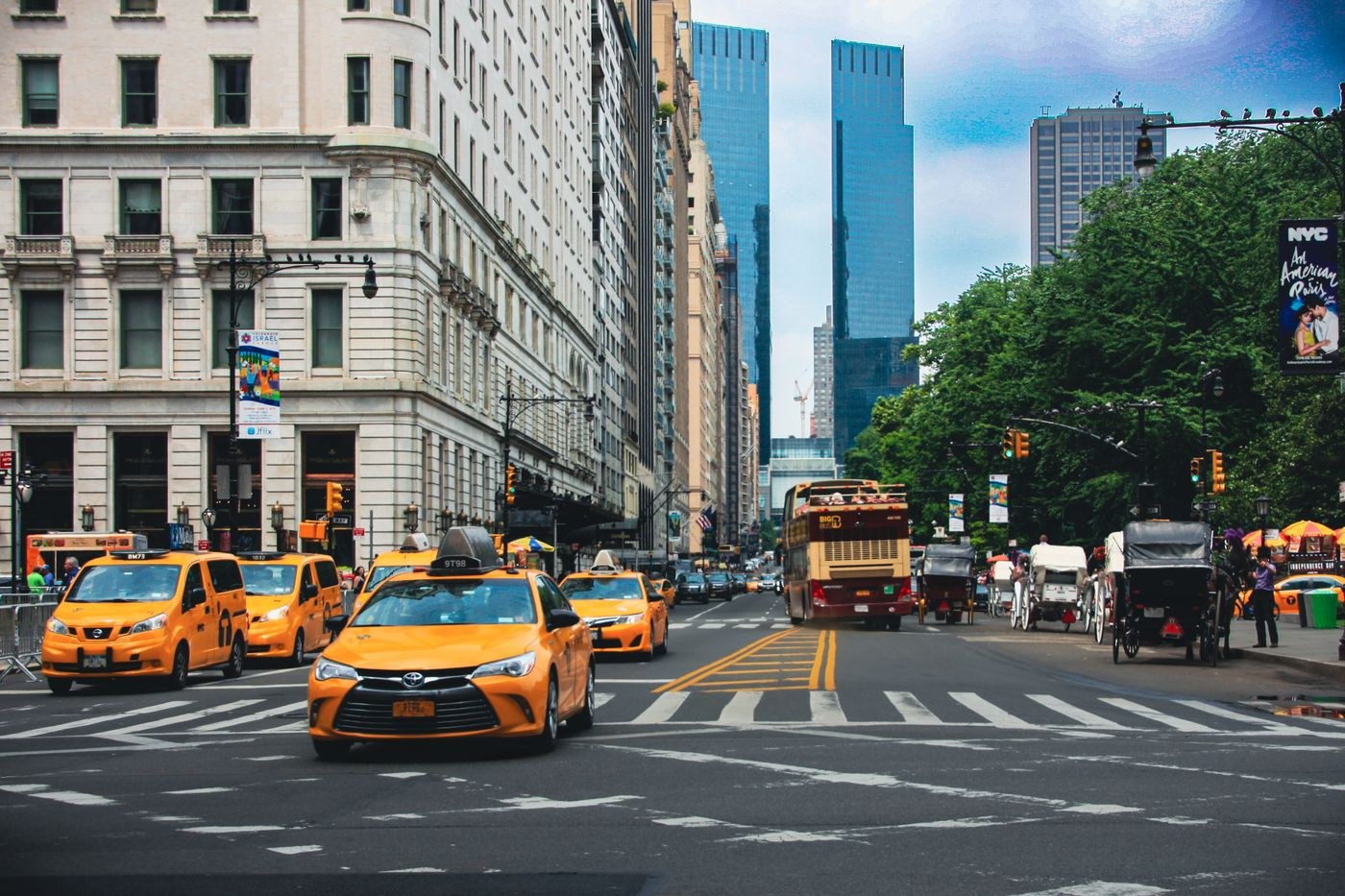 Yellow taxis along a city street