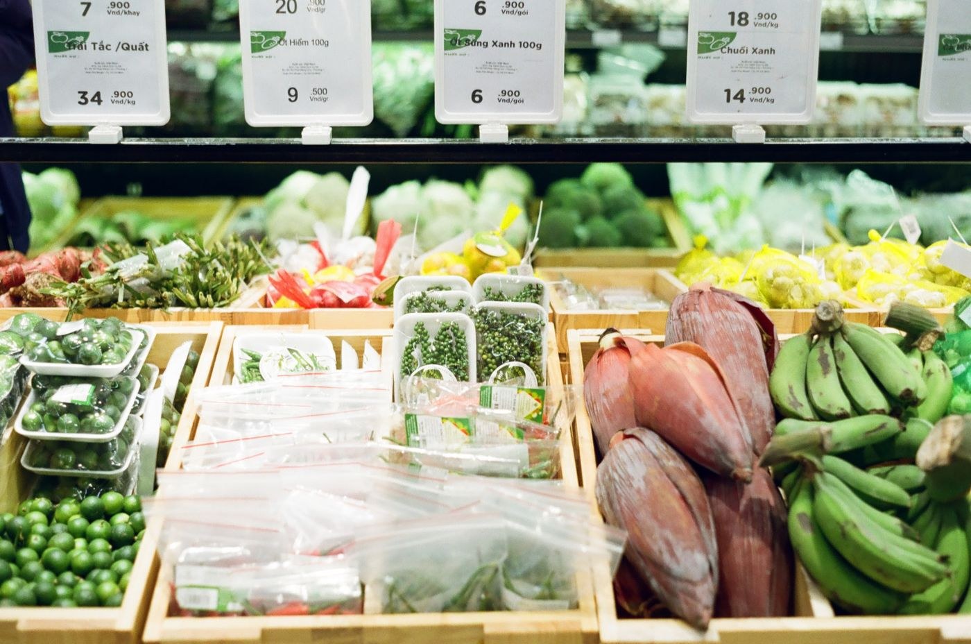 Vegetables and price labels on a market display
