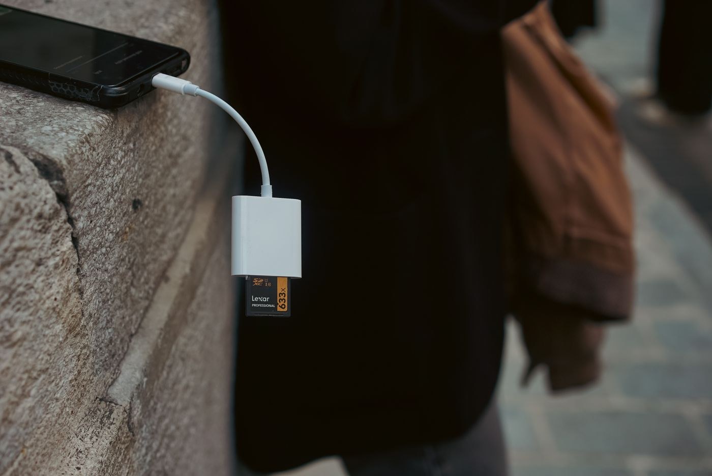 Smartphone connected to a memory card reader